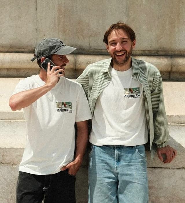 Two Axioms friends wearing Axioms Co. t-shirts